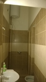 Lakásfelújítás Budapesten, fürdőszoba burkolás, festés